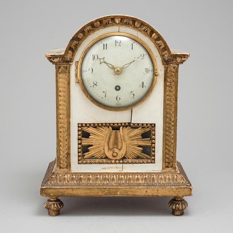 A Swedish late gustavian table clock, ca 1800.