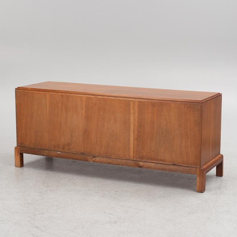 a walnut sideboard, Stockholm, 1932.