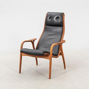 Yngve Ekström, an oak and leather "Lamino" asrmchair dated 1965.