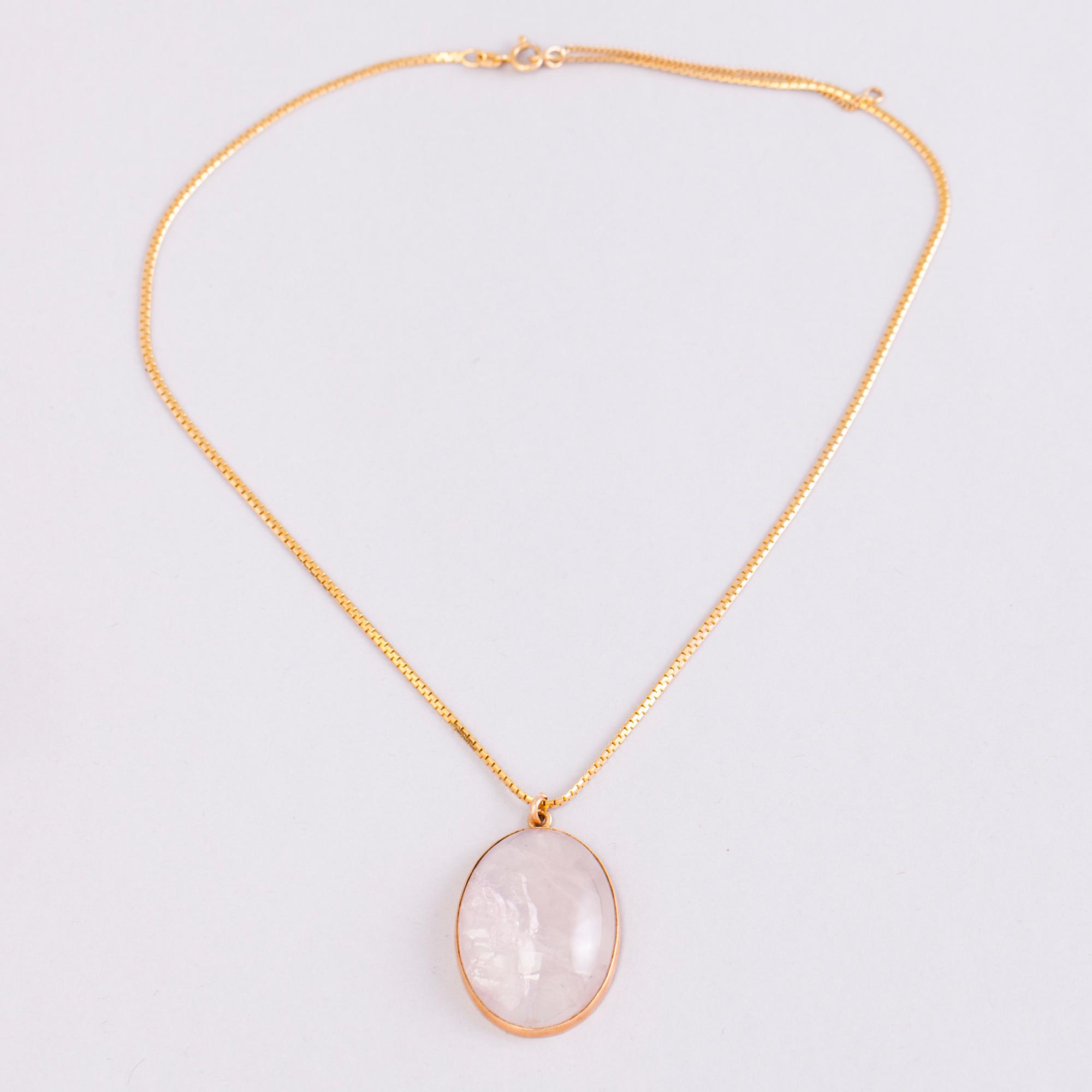 A 1950s three piece jewellery set with 14K gold and rose quartz.