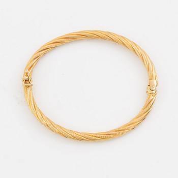 Armring, vriden dekor, guld.