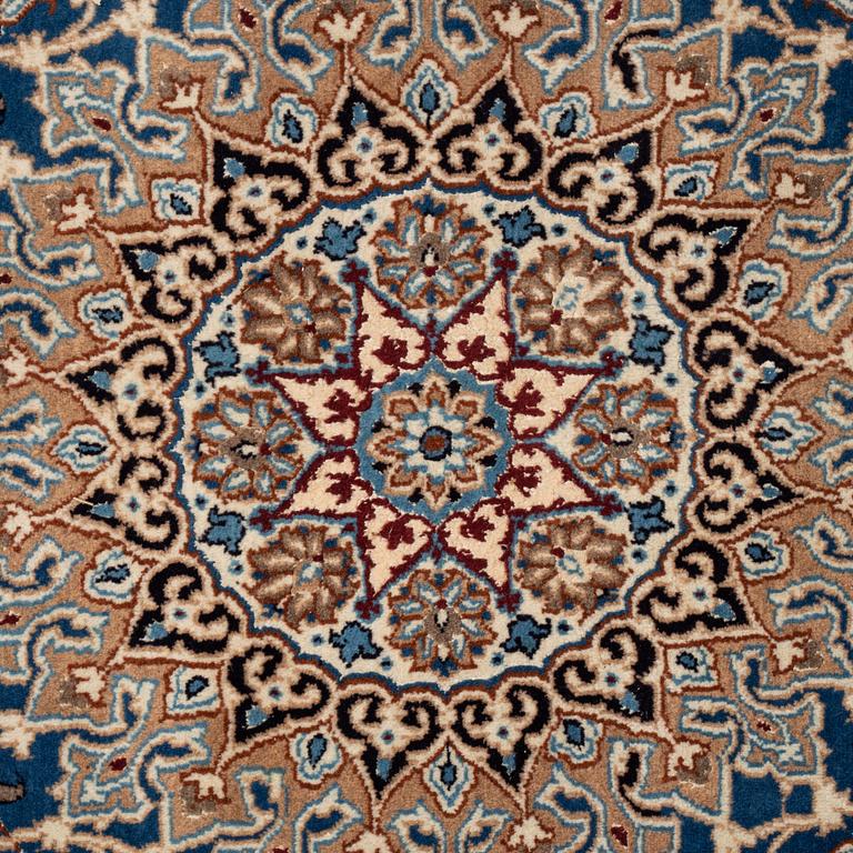 A carpet, Old Nain, part silk, ca 285 x 198 cm.