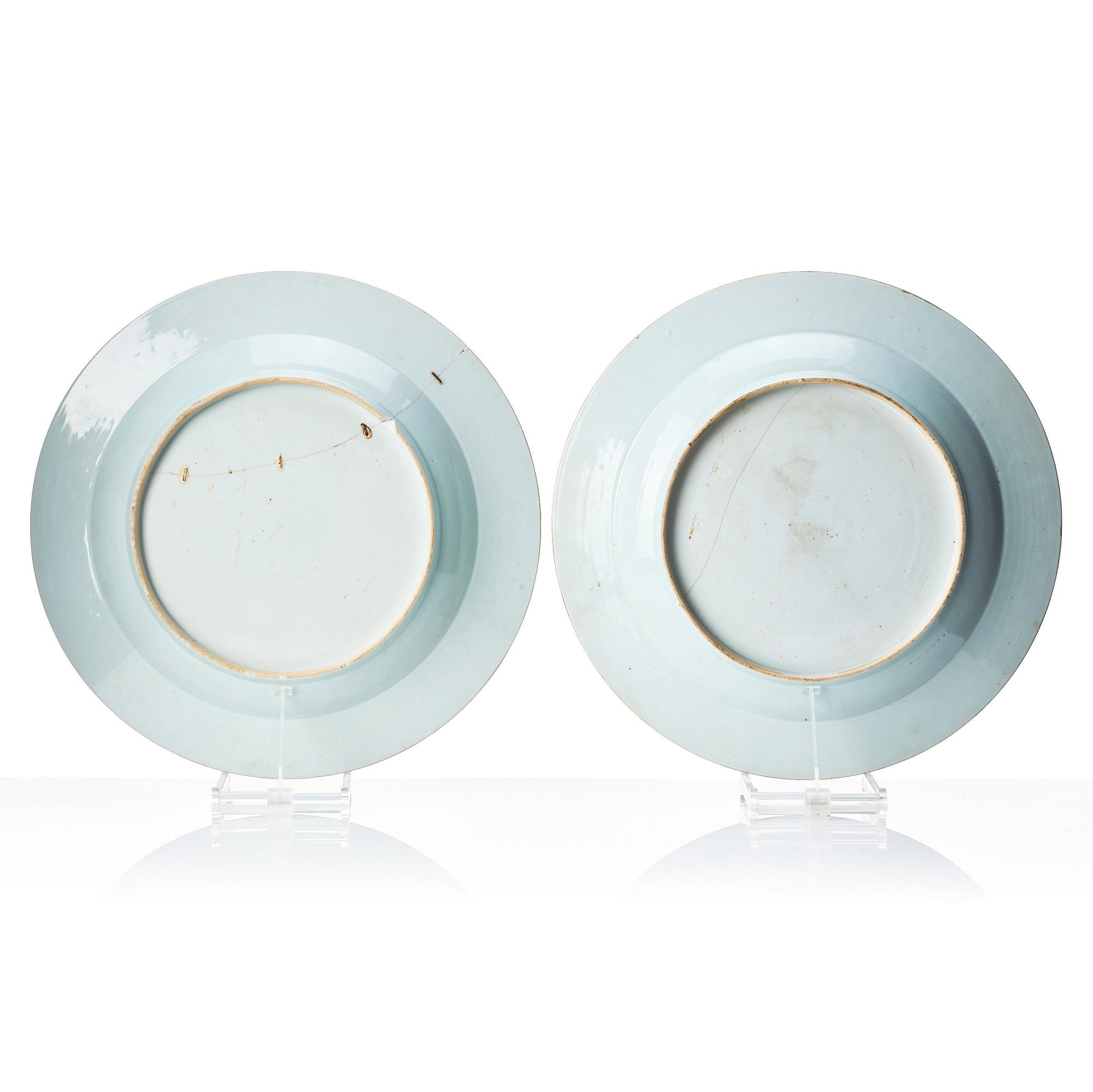 A pair of monogrammed chargers, Qingdynasty, Qianlong (1736-95), dated 1741.