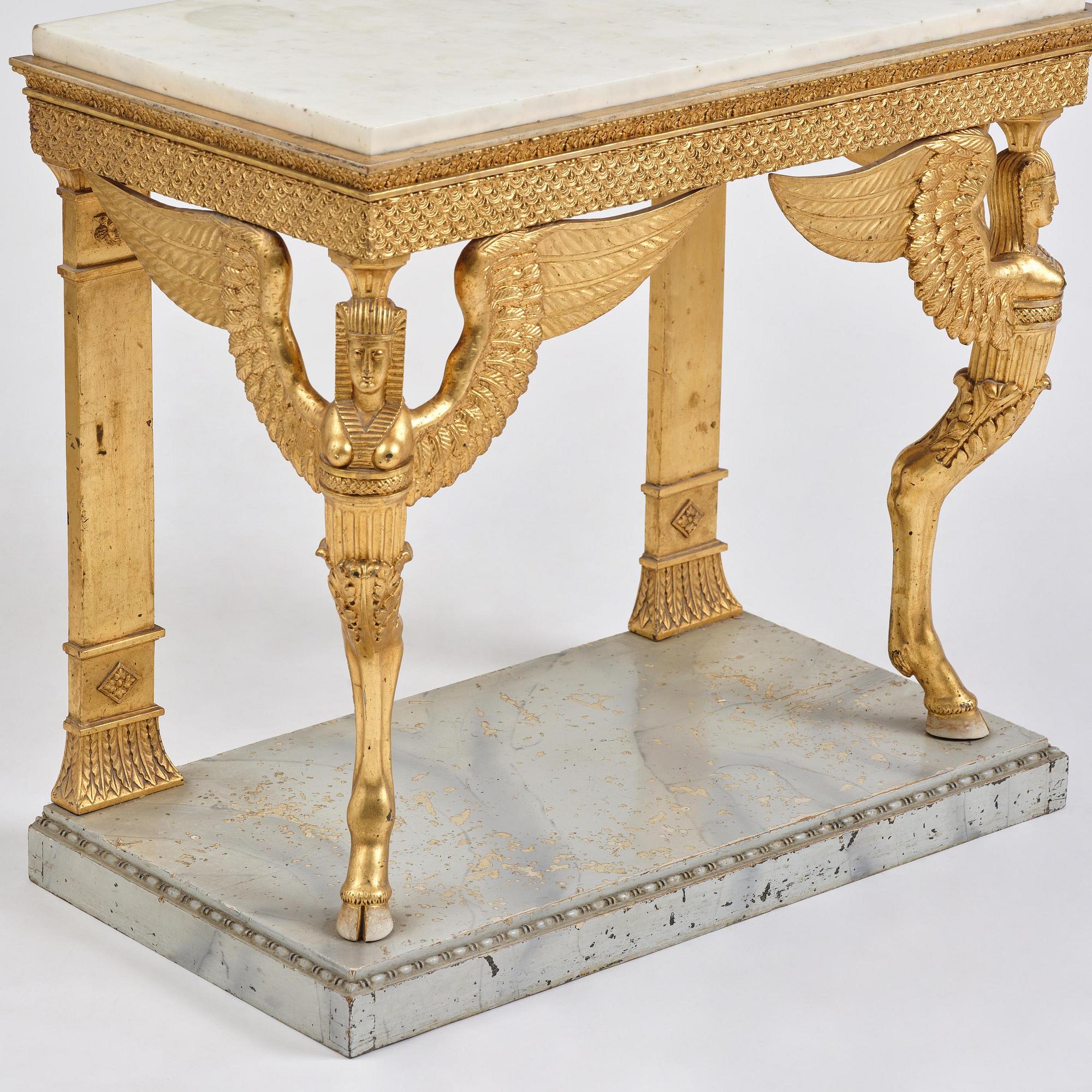 A late Gustavian giltwood console in the manner of J. Frisk, Stockholm, early 19th century.
