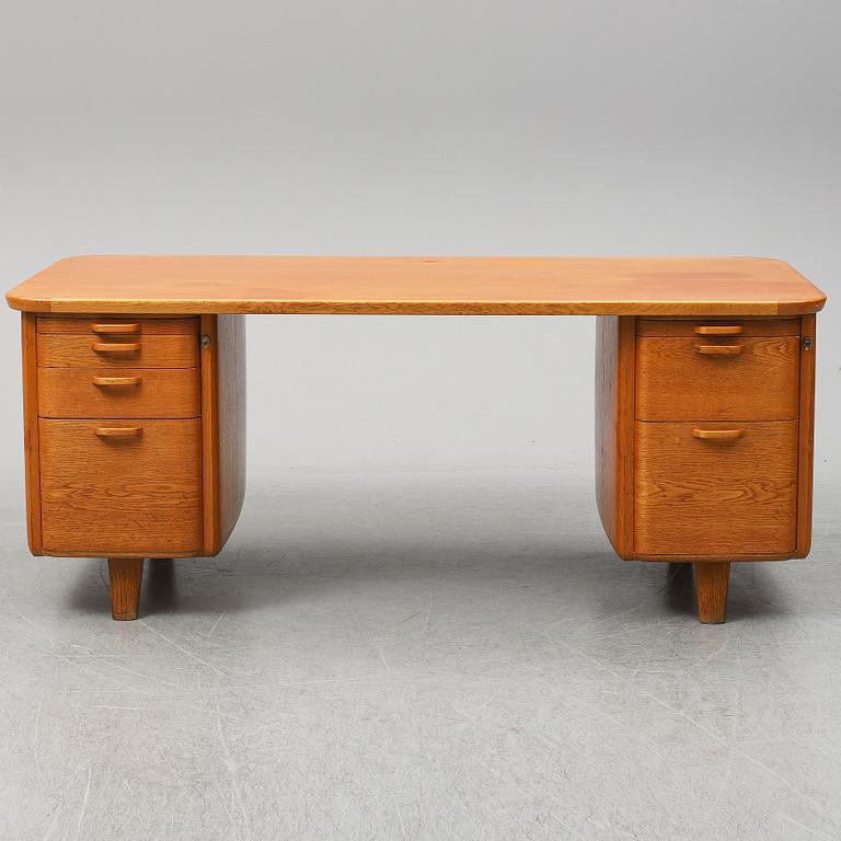 A 1950/60's oak writing desk.