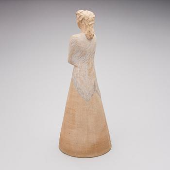 A signed stoneware sculpture.