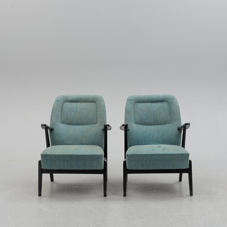 A pair of mid 20th century easy chairs.