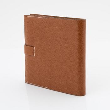 Hermès, a whisky leather notebook/agenda.