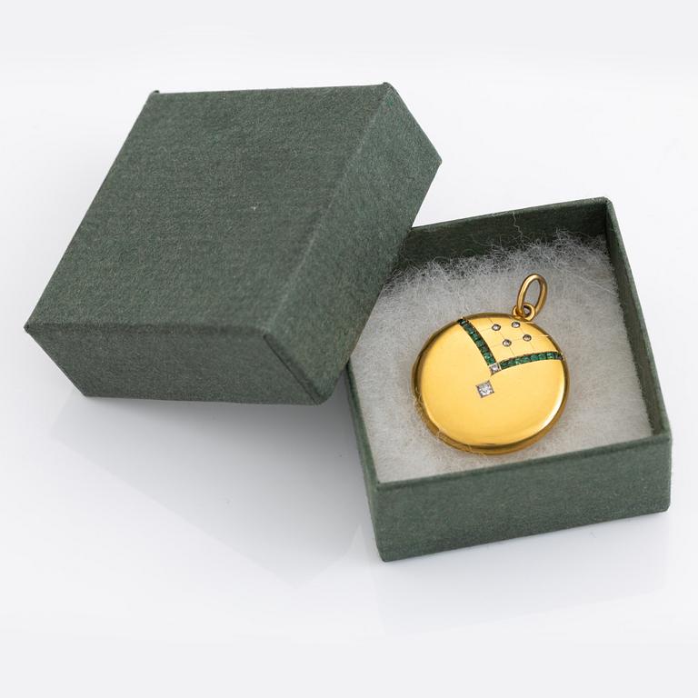 18K gold, emerald and diamond locket pendant.