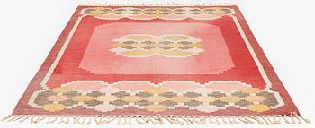 Ingegerd Silow, a carpet, flat weave, c 281 x 189 cm, signed IS.