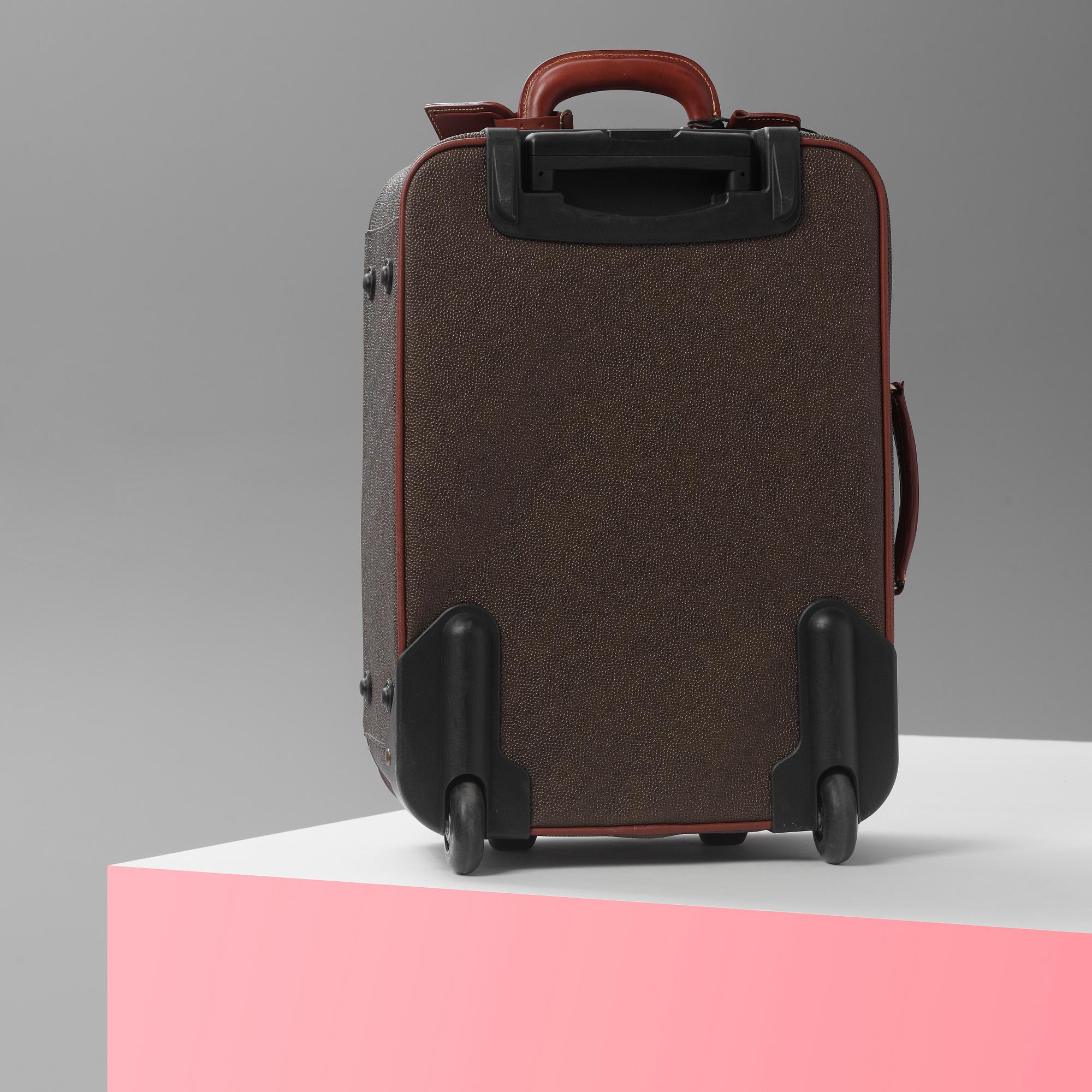 A hardsided trolley by Mulberry.