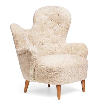 304. A Swedish Modern upholstered armchair, 1940's.