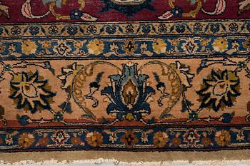 A carpet, semi-antique Tabriz, ca 357,5 x 256 cm.