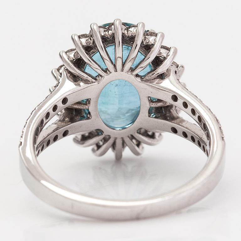 A 14K white gold ring with a ca 3.35 ct emerald and diamonds ca. 0.69 ct in total. IGI certificate.