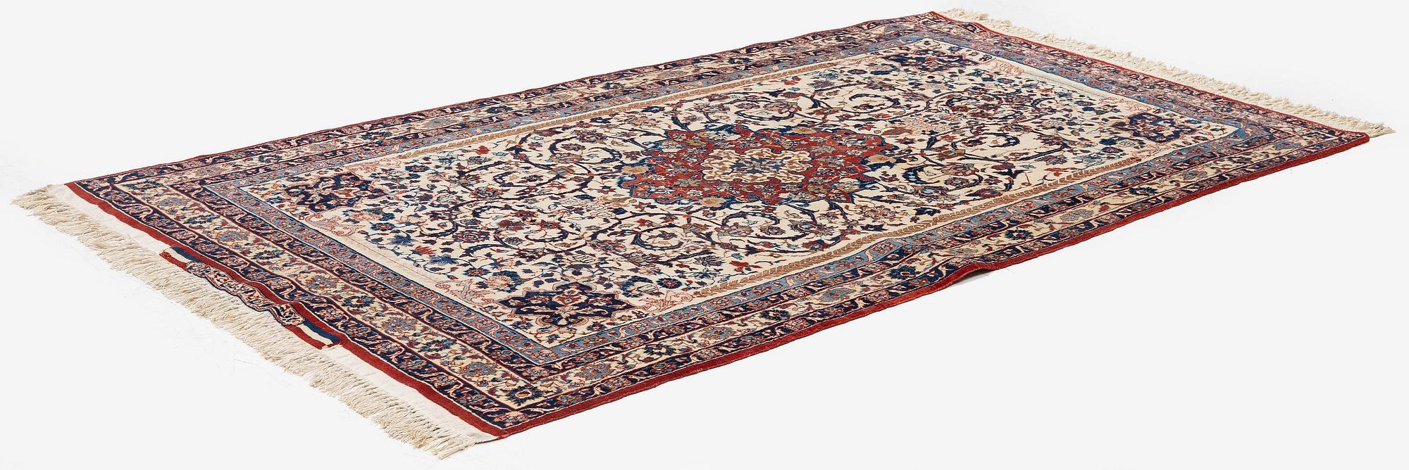 An Isfahan carpet, Central Persia, signed (Hossein) Seirafian, c. 178 x 102 cm.