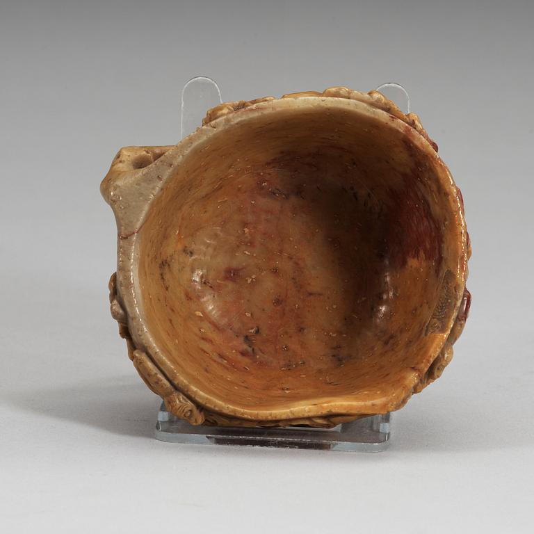 A soapstone sculpture and cup, Qing dynasty.