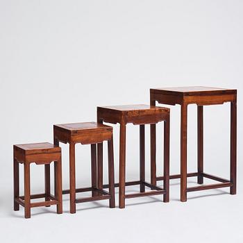 A huanghuali four piece corner leg nesting table, Qing dynasty.