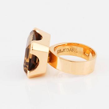 Bengt Liljedahl, an 18K gold ring set with a faceted smoky quartz, Stockholm 1965.