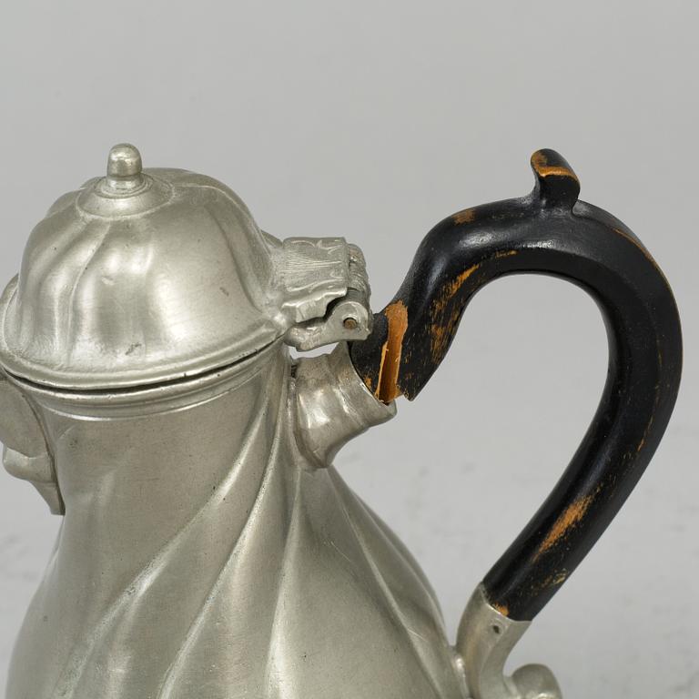 A pewter butter box, chocolate pot, sugar shaker and a canteen, one P Norén Hedemora 1766.