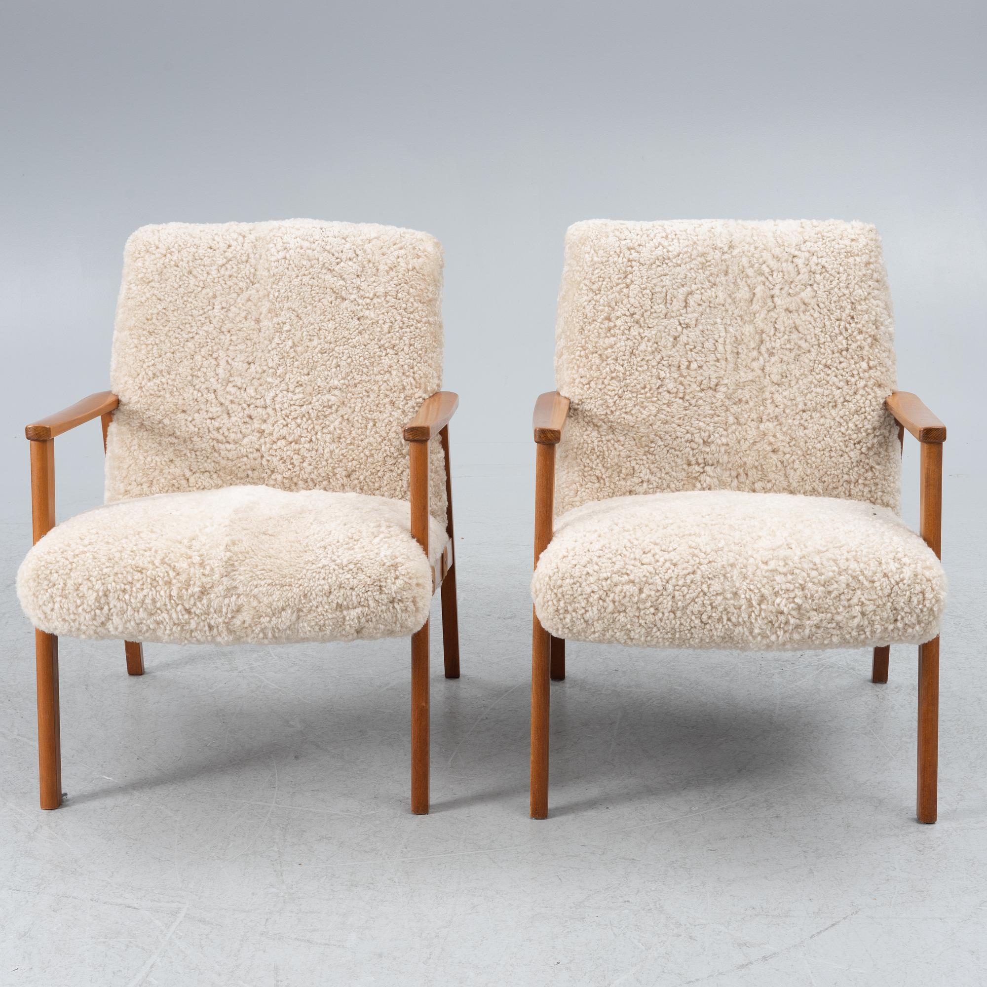 A pair of armchairs, mid-20th century.