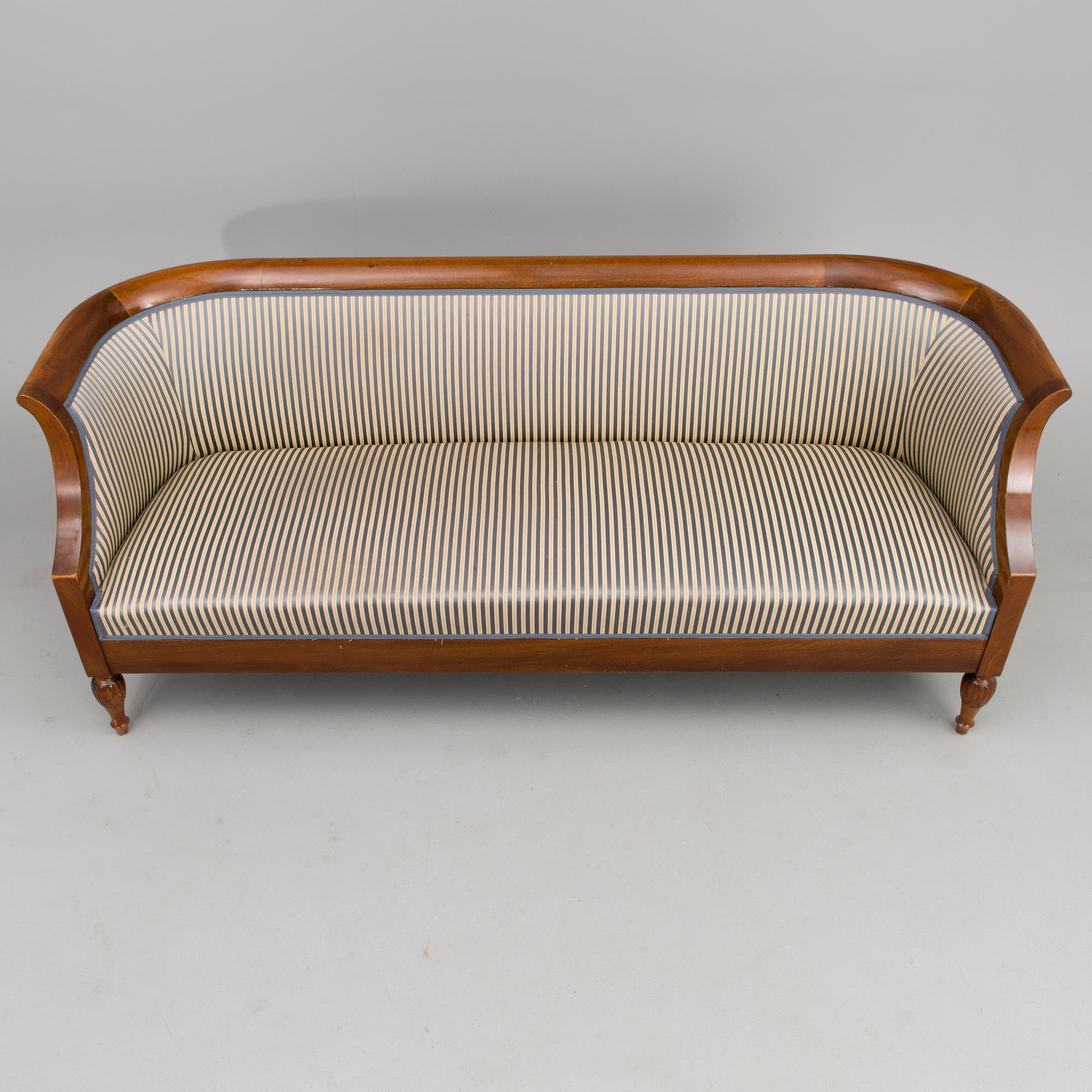 A mid-late 19th Century four-piece sofa suite.