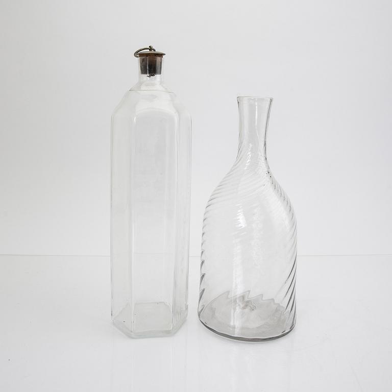 A set of four 19th/20th century glass decanters.