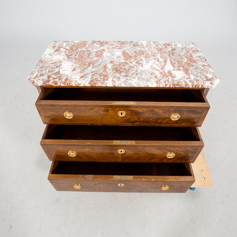 A Gustavian style mid 1900s mahogany dresser.