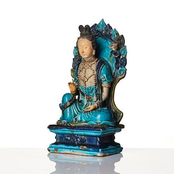 A  turquoise glazed figure of Guanyin, Ming dynasty (1368-1644).