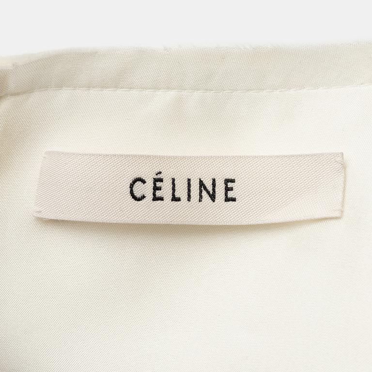 Céline, a bow top, size 36.