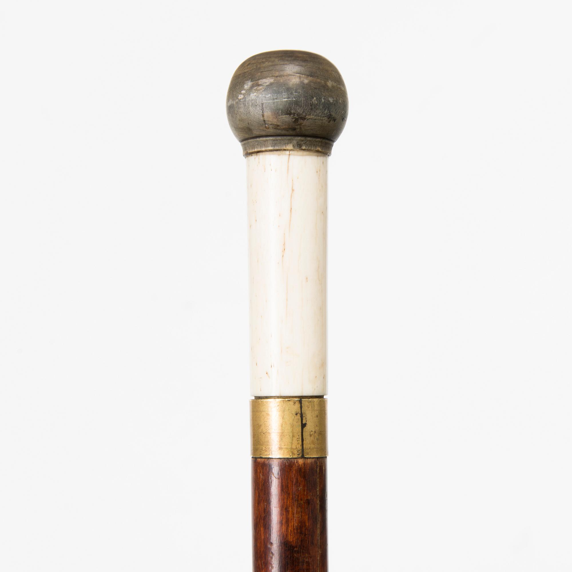 KÄPPSVÄRD, trä, mässing och ben, 1800-talets slut.