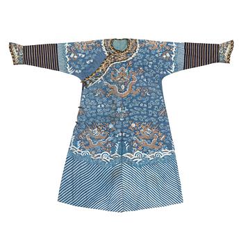 1003. A five clawed dragon kesi robe on blue ground, Jifu, Qing dynasty, 19th Century.