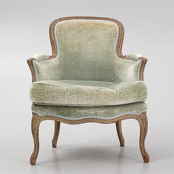 A Louis XV-style Bergère, 20th century.