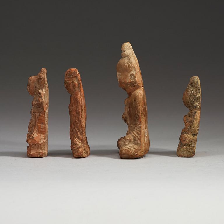 Four terracotta figures depicting various deities with attributes, Song Dynasty (960-1279).