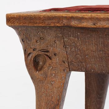 Swedish Art Nouveau, a carved oak stool, early 1900s.