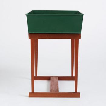 Josef Frank, a mahogany and tin flower stand, model no 2084, Svenskt Tenn Sweden 1950-60s.
