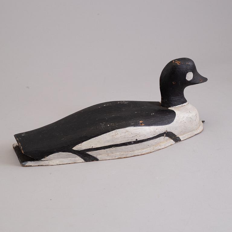 4 painted wooden ducks from the 20th century.