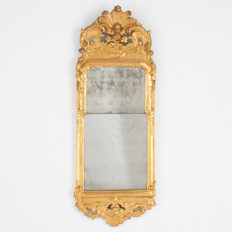 A Rococo mirror by Samuel Bomansson, Sweden, second half of the 18th century.