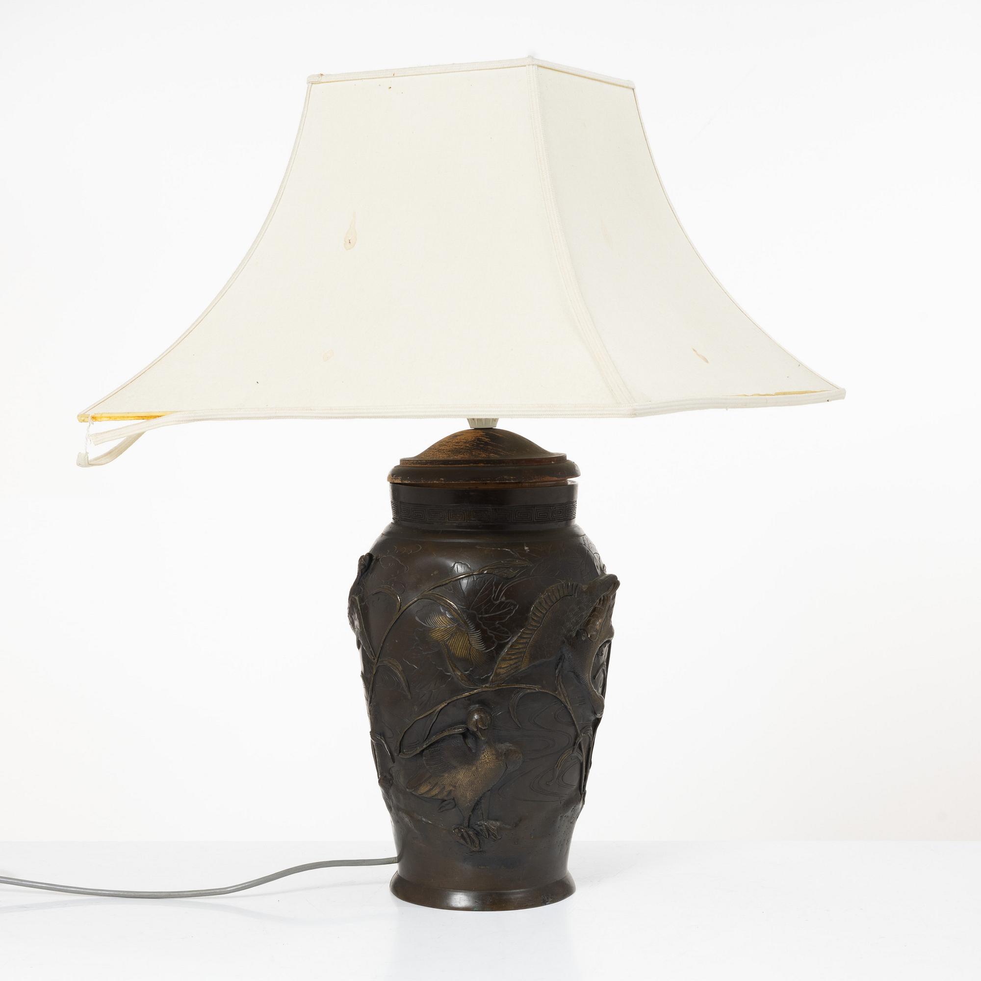 A Japanese bronze table lamp, 20th century.