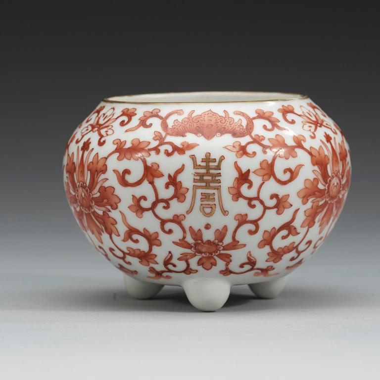 A red lotus tripod brush washer, Qing dynasty, 19th Century.