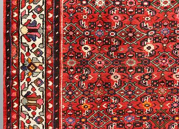 A Hosseinabad carpet, c 301 x 215 cm.