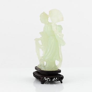 A Chinese stone scultpure of an elgegant lady, 20th Century.