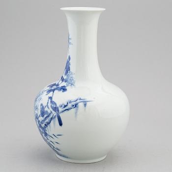 A Chinese blue and white vase, 20th Century with Guangxu mark.