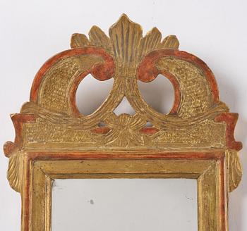 A pair of Gustavian giltwood mirrors by N. Falkengren (master in Jönköping 1776-1813).