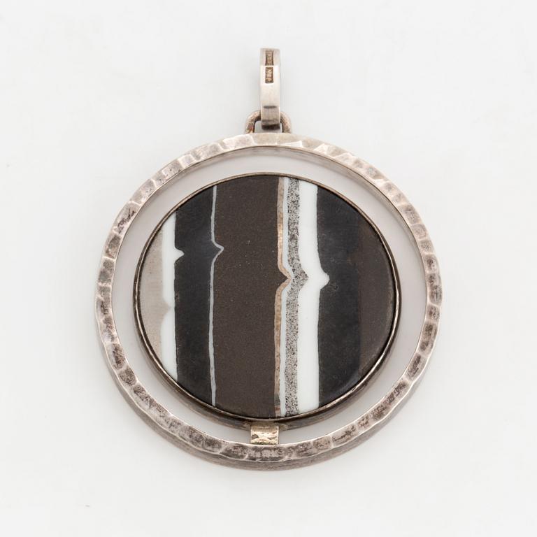 CLAËS E. GIERTTA, a sterling silver and painted porcelain pendant from Stockholm, 1986.