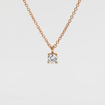 Tiffany & Co,  halsband, 18K guld och briljantslipad diamant ca 0.17 ct.