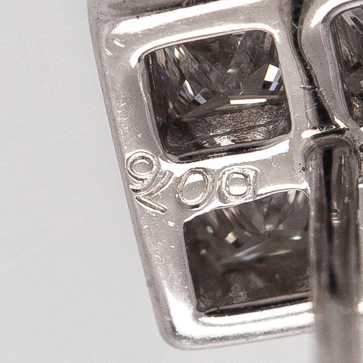 Earrings, princess cut diamonds, 18K white gold.