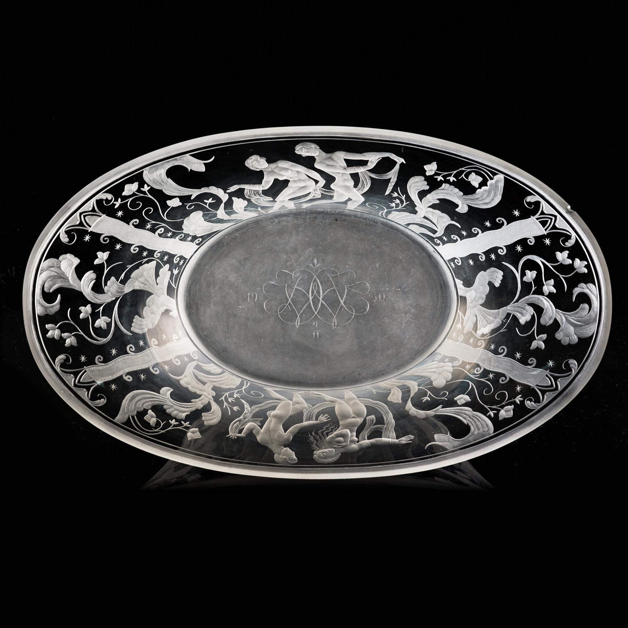 Simon Gate, a Swedish Grace engraved glass bowl with stand, Orrefors 1930, model 147, engraved by Karl Rössler.