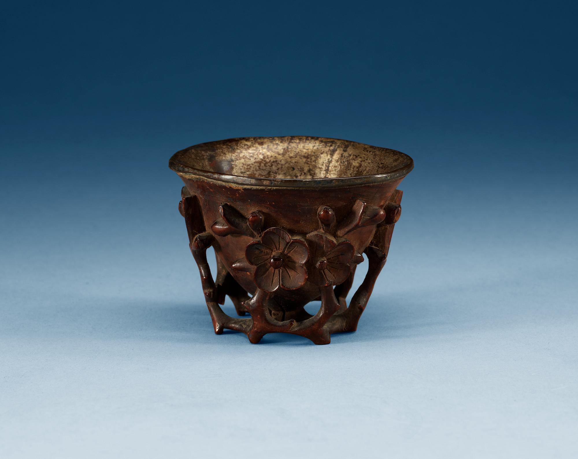 A carved bambu libation cup, Qing dynasty.