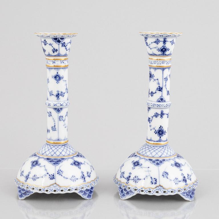 A pair of 'Blue Fluted Full Lace' porcelain Candle sticks, Royal Copenhagen, model number 1008, post 1923.