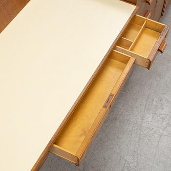 A mahogany, walnut and rosewood veneer set of cabinets with desk, Jönköping Möbelfabriks Aktiebolag. 1950's.